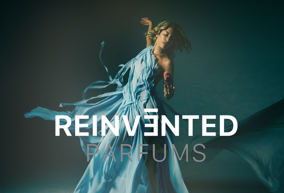 lucid dream perfume bottle by Reinvented Parfums, niche fragrance saffron rose oud, luxury unisex perfume flatlay, dreamy surreal perfume imagery